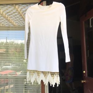 White long sleeve dress with little flappers